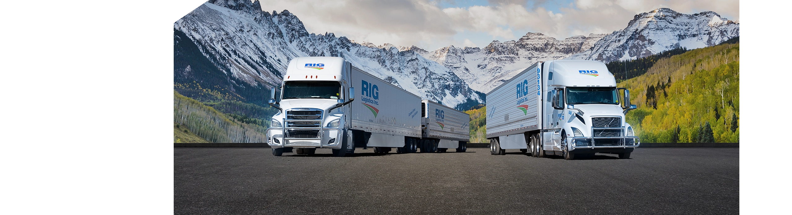 RIG Logistics long combination vehicle (LCV) and highway truck parked in front of Western Canadian mountains